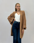 Cardigan lungo comodo con tasche