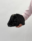 Borsa pochette con intrecci