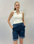 Pantaloncini con ricami margherita e risvolto