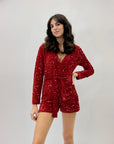 Tuta corta con paillettes