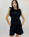 Maglia con maniche in tulle tinta unita