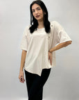 Maglia comoda con dettaglio bottoni