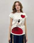 T-shirt in cotone con donna e palloncino
