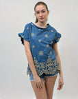 Maglia con ricami e volant