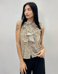 Blusa smanicata con rouches