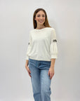 Maglia con maniche a sbuffo con gioielli