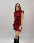Abito corto con paillettes scollo schiena
