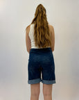 Pantaloncini con ricami margherita e risvolto