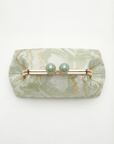 Borsa Clutch elegante con chiusura gioiello