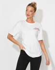T-shirt con stampa “Chi mi regge un attimo l'ansia?”