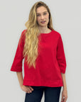 Blusa girocollo in cotone con manica a 3/4 e linea pulita