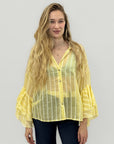Blusa leggera a righe con maniche ampie a balze