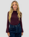 Maglia donna con strass e collo alto