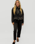 Completo donna con giacca zip e pantaloni
