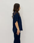 Camicia con maniche arrotolate