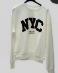 Felpa donna NYC con applicazione teddy e borchie