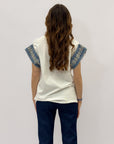 T-shirt in cotone con maniche decorate