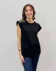 T-shirt con borchie