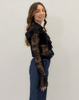 Camicia in pizzo con volant