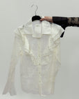 Camicia in pizzo con volant