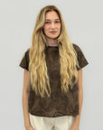 Blusa ricamata con fiocco sul retro elegante e raffinata