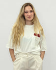 T-shirt con taschino e dettaglio cuore