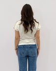 T-shirt con dettaglio e paillettes sulle spalle