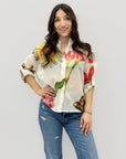 Camicia con fiori e paillettes