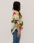 Camicia con fiori e paillettes