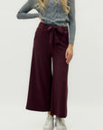 Pantaloni a palazzo con cintura in vita