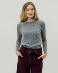 Maglia a treccia con dettagli classici