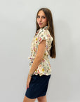 Camicia floreale con nodo