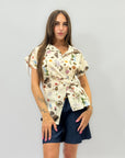 Camicia floreale con nodo