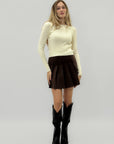 Gonna corta in suede plissettata – Stile chic e femminile