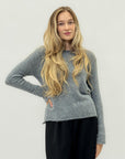 Maglione girocollo in lana effetto nuvola – Morbidezza e comfort assoluto