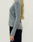 Maglione girocollo in lana effetto nuvola – Morbidezza e comfort assoluto