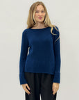 Maglione girocollo in lana effetto nuvola – Morbidezza e comfort assoluto