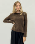Maglione girocollo in lana effetto nuvola – Morbidezza e comfort assoluto
