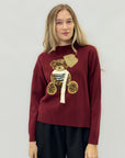 Maglione morbido con orsetto ricamato
