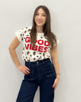 T-shirt con scritta "good vibes"