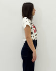 T-shirt con scritta "good vibes"