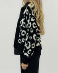 Cardigan maculato in maglia