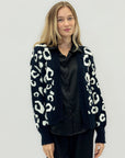 Cardigan maculato in maglia