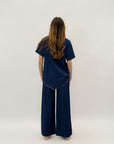 Completo denim maglia e pantalone