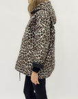 Piumino leopardato con cappuccio