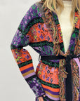 Cardigan fantasia etnica con frange e cintura – Stile boho chic