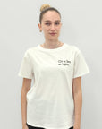 T-shirt Bianca con Scritta “Chi sa fare sa capire”