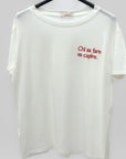T-shirt Bianca con Scritta “Chi sa fare sa capire”