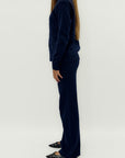 Completo maglia treccia e pantalone – Stile e comfort invernale
