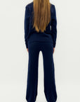 Completo maglia treccia e pantalone – Stile e comfort invernale